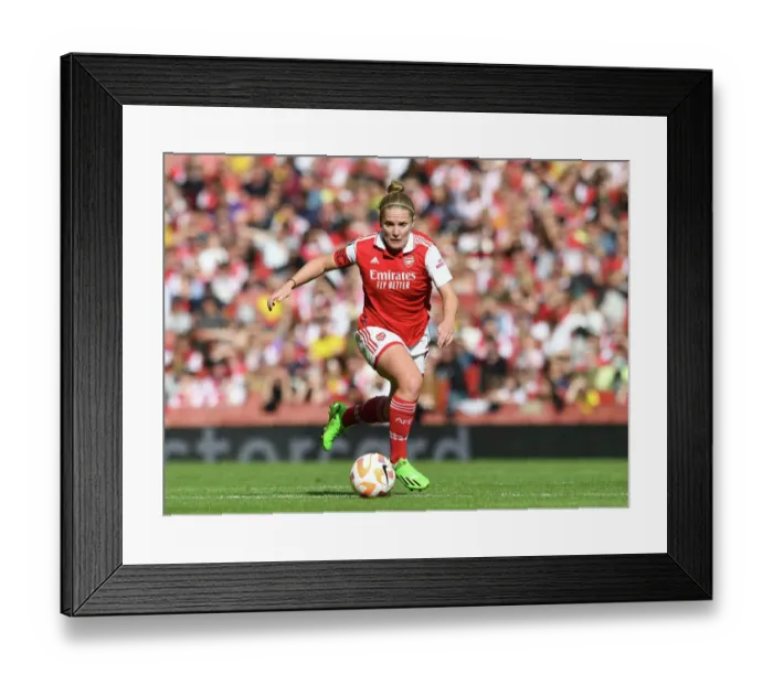 Framed Print : London Rivalry: Arsenal vs. Tottenham Clash in FA Womens Super League - Arsenal's Kim Little Fights for Victory