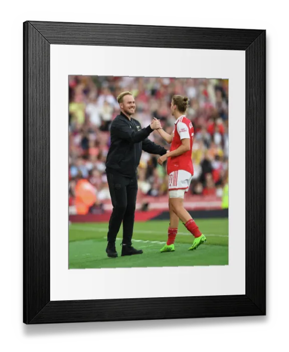 Framed Print : Arsenal Women Triumph Over Tottenham Hotspur in FA WSL Clash: Miedema Celebrates with Coach Eidevall