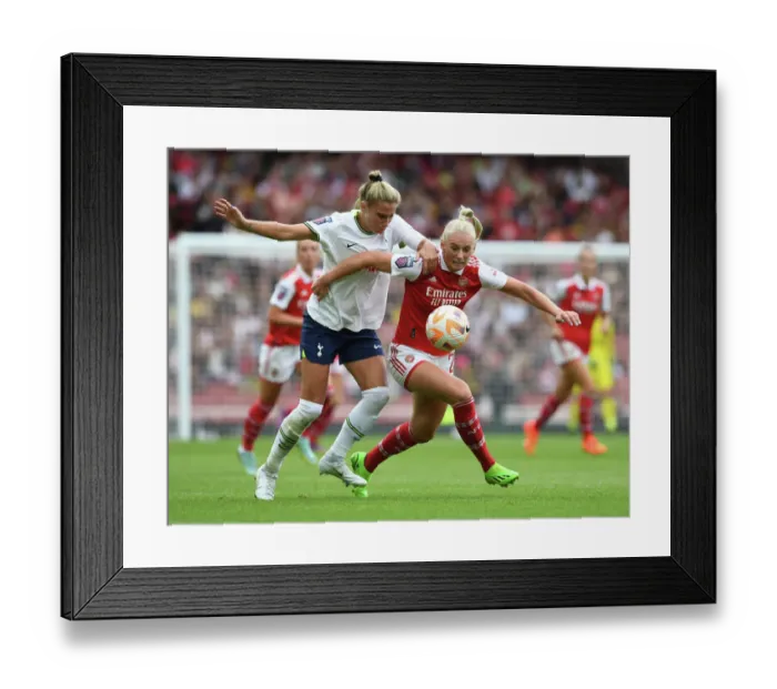 Framed Print : Arsenal vs. Tottenham: Clash in the FA Womens Super League at Emirates Stadium