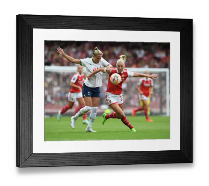 Framed Print : London Rivalry: Arsenal's Stina Blackstenius vs. Tottenham's Molly Bartrip Clash in FA Womens Super League Framed Print : London Rivalry: Arsenal's Stina Blackstenius vs. Tottenham's Molly Bartrip Clash in FA Womens Super League