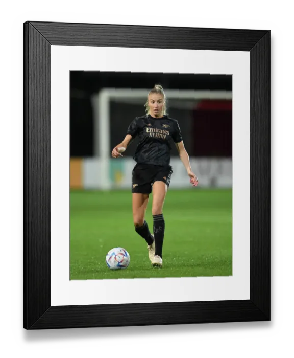 Framed Print : Arsenal's Leah Williamson Faces Off Against AFC Ajax in UEFA Women's Champions League Qualifier