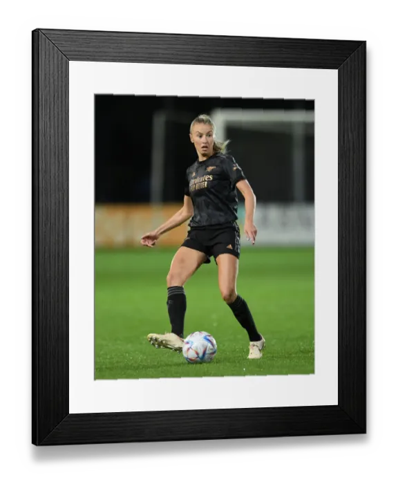Framed Print : Arsenal's Leah Williamson Clashes with Ajax in UEFA Women's Champions League Battle