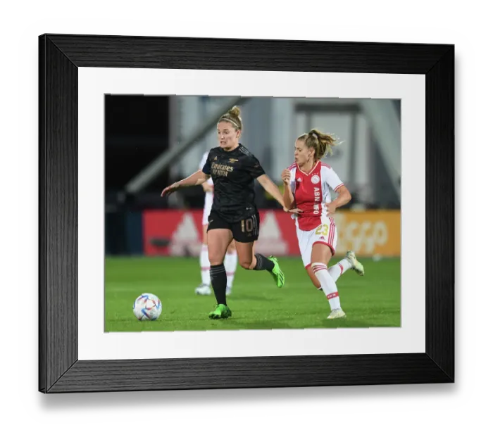 Framed Print : Arsenal vs. Ajax Women: Kim Little Clashes with Victoria Pelova in UEFA Champions League Showdown Framed Print : Arsenal vs. Ajax Women: Kim Little Clashes with Victoria Pelova in UEFA Champions League Showdown
