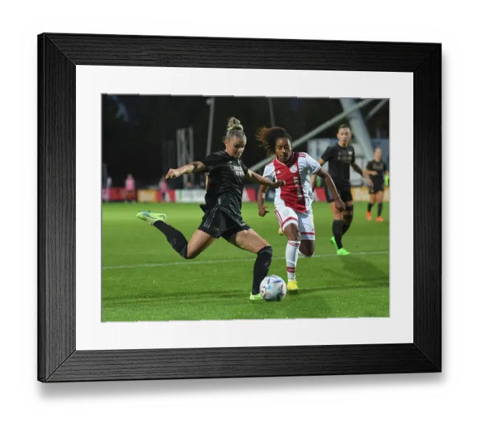 Framed Print : Battle in Amsterdam: Arsenal vs. Ajax Women - UEFA Champions League Second Qualifying Round