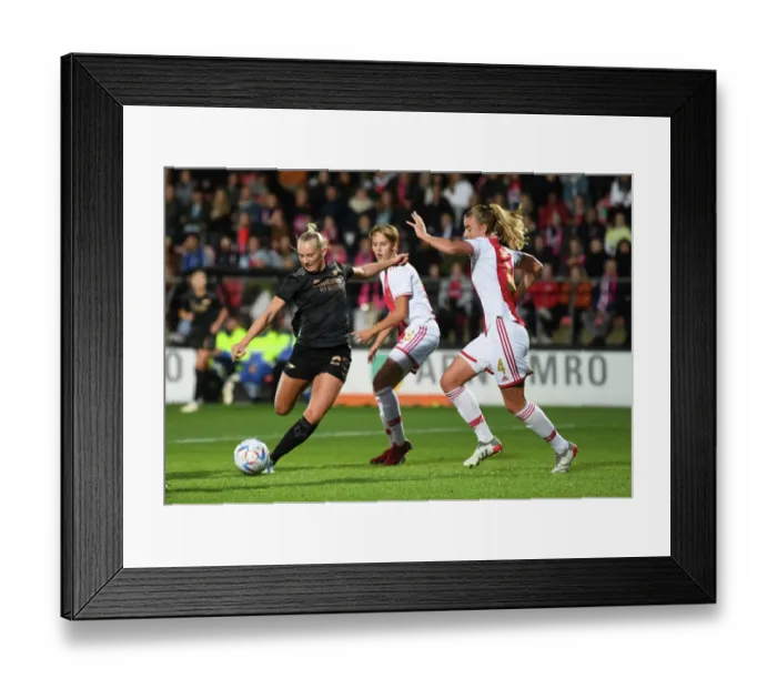 Framed Print : Arsenal vs Ajax: Stina Blackstenius Takes Shot Amid Pressure in UEFA Women's Champions League Qualifier Framed Print : Arsenal vs Ajax: Stina Blackstenius Takes Shot Amid Pressure in UEFA Women's Champions League Qualifier