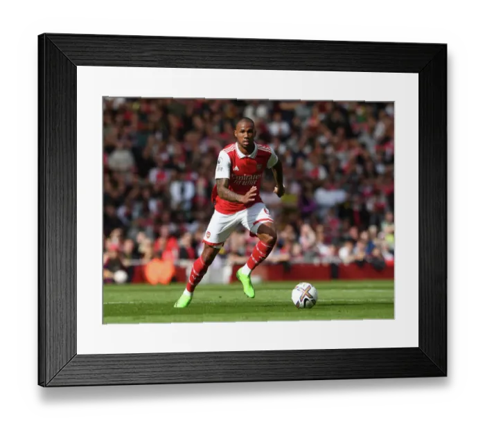 Framed Print : Arsenal's Gabriel Magalhaes Faces Off Against Tottenham in the 2022-23 Premier League Battle