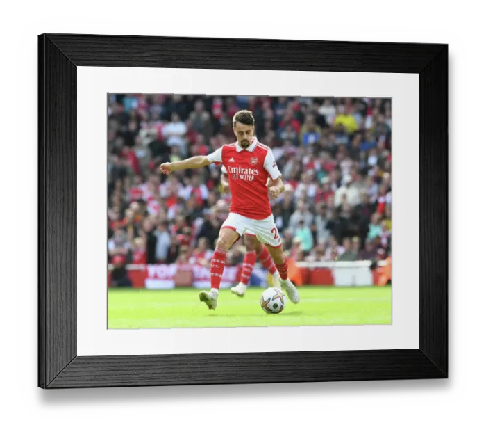 Framed Print : Arsenal's Fabio Vieira Goes Head-to-Head with Tottenham in the 2022-23 Premier League Battle
