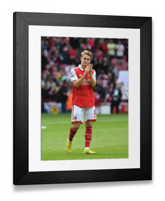 Framed Print : Arsenal's Martin Odegaard Celebrates with Fans after Arsenal vs. Tottenham Match, 2022-23 Premier League Framed Print : Arsenal's Martin Odegaard Celebrates with Fans after Arsenal vs. Tottenham Match, 2022-23 Premier League