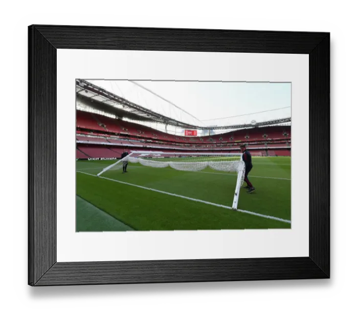Framed Print : Arsenal vs. Tottenham: Preparing for the Big Game - Setting the Stage at Emirates Stadium