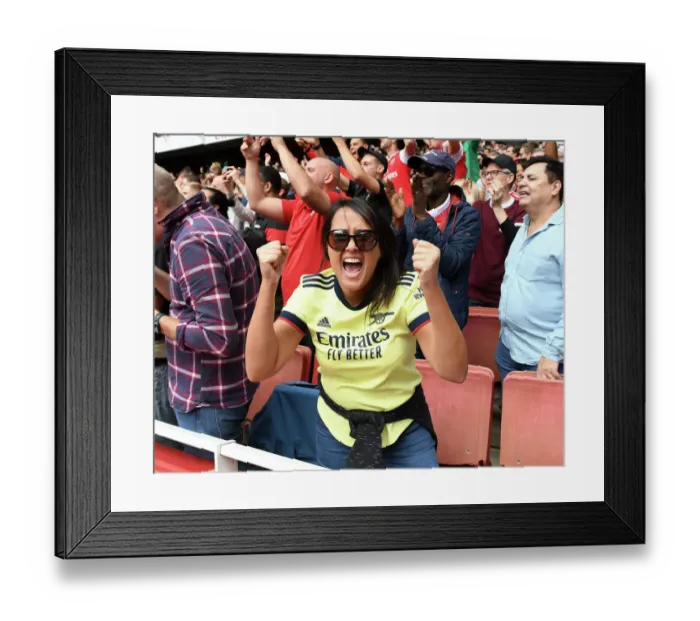 Framed Print : Arsenal's Derby Triumph: Euphoric Fans Celebrate Victory over Tottenham in the 2022-23 Premier League