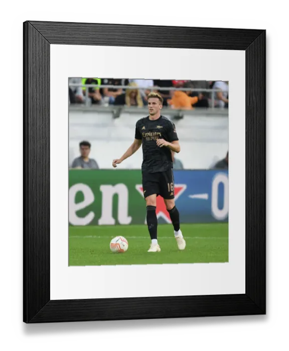 Framed Print : Arsenal's Rob Holding Goes Head-to-Head with FC Zurich in Europa League Clash (September 2022)