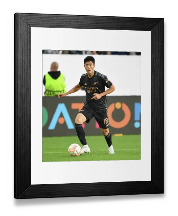 Framed Print : Takehiro Tomiyasu in Action: Arsenal vs. FC Zurich, Europa League 2022-23