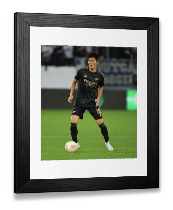 Framed Print : Takehiro Tomiyasu in Action: Arsenal vs FC Zurich, Europa League 2022-23