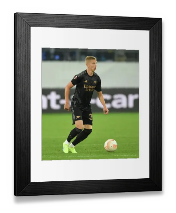 Framed Print : Arsenal's Oleksandr Zinchenko Faces Off Against FC Zurich in Europa League Match