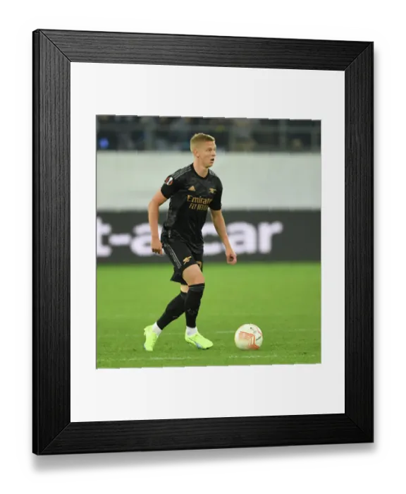 Framed Print : Arsenal's Zinchenko Faces Off in Europa League Clash against FC Zurich