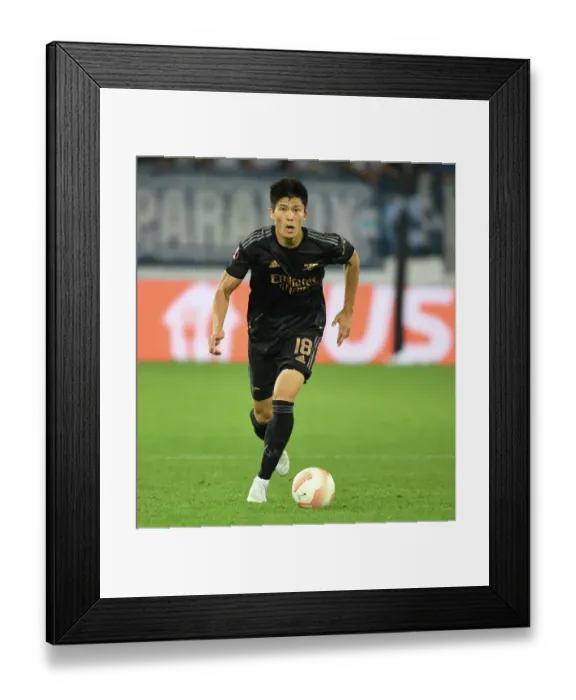 Framed Print : Takehiro Tomiyasu in Action: Arsenal's Japanese Defender Shines in Europa League Clash against FC Zurich Framed Print : Takehiro Tomiyasu in Action: Arsenal's Japanese Defender Shines in Europa League Clash against FC Zurich