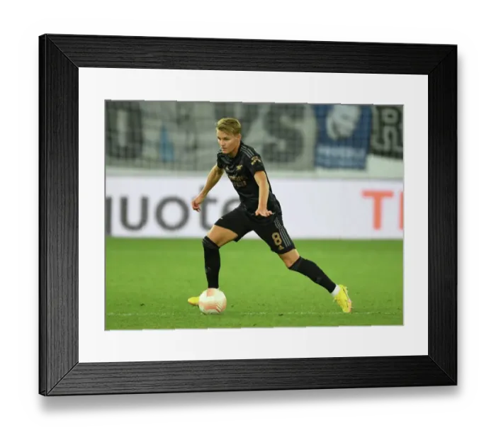 Framed Print : Arsenal's Martin Odegaard Leads the Charge Against FC Zurich in Europa League Clash