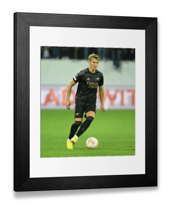 Framed Print : Arsenal's Martin Odegaard Shines in Europa League Clash Against FC Zurich
