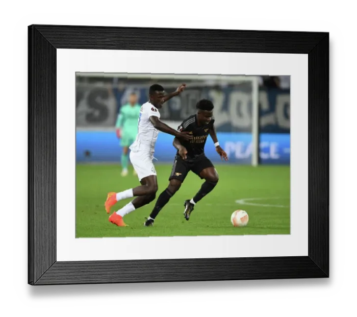 Framed Print : Bukayo Saka Dashes Past FC Zurich's Code Cheick Oumar: Arsenal's Europa League Group A Clash