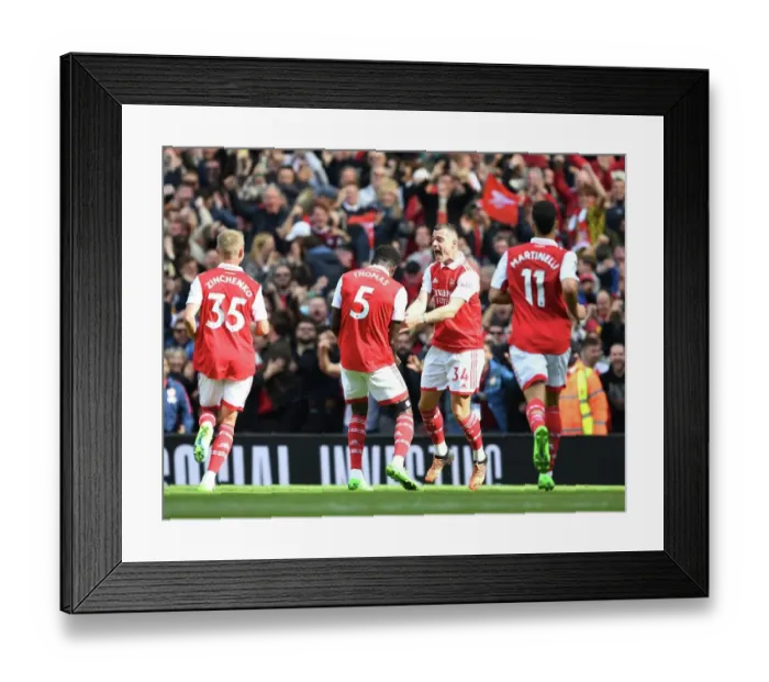 Framed Print : Thomas Partey and Granit Xhaka Celebrate Arsenal's First Goal Against Tottenham Hotspur (2022-23)