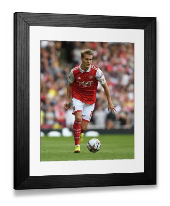 Framed Print : Martin Odegaard vs. Tottenham: Arsenal's Midfield Battle at Emirates Stadium, 2022-23 Premier League