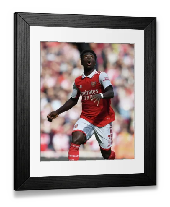 Framed Print : Arsenal's Bukayo Saka Goes Head-to-Head with Tottenham in the Intense 2022-23 Premier League Showdown Framed Print : Arsenal's Bukayo Saka Goes Head-to-Head with Tottenham in the Intense 2022-23 Premier League Showdown