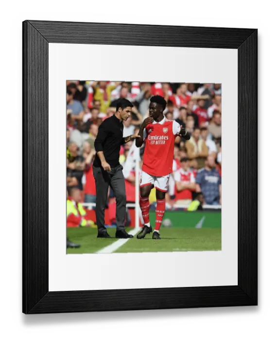 Framed Print : Arsenal Manager Mikel Arteta Motivating Bukayo Saka Amidst Arsenal v Tottenham Rivalry (2022-23) Framed Print : Arsenal Manager Mikel Arteta Motivating Bukayo Saka Amidst Arsenal v Tottenham Rivalry (2022-23)
