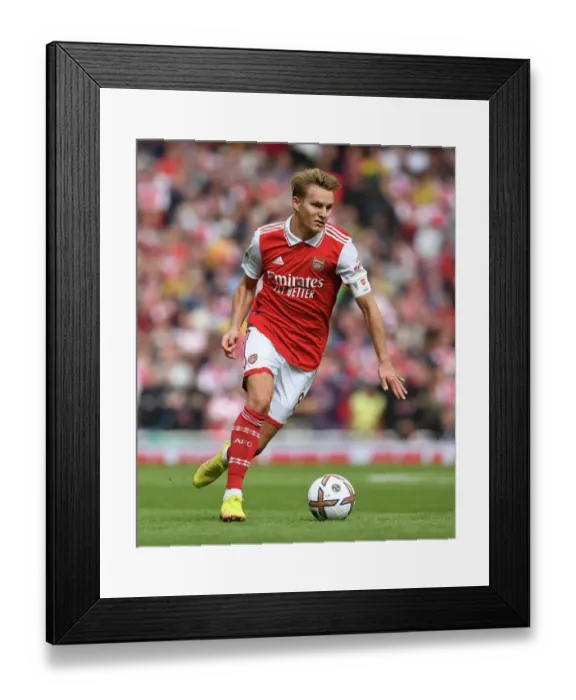 Framed Print : Arsenal vs. Tottenham: Martin Odegaard's Intense Showdown in the 2022-23 Premier League Clash Framed Print : Arsenal vs. Tottenham: Martin Odegaard's Intense Showdown in the 2022-23 Premier League Clash