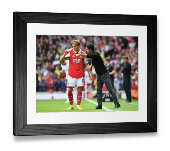 Framed Print : Arsenal Manager Mikel Arteta Conferencing with Martin Odegaard Amidst Arsenal v Tottenham Rivalry (2022-23)
