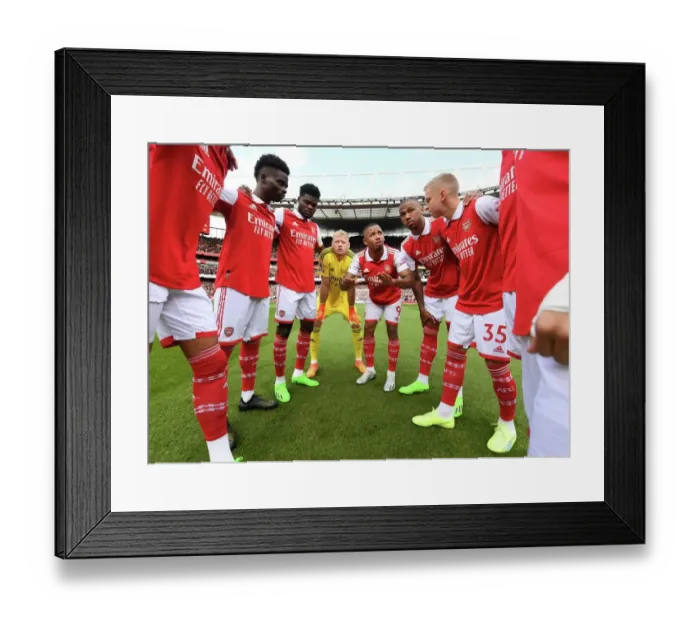Framed Print : Arsenal Players Unite Ahead of Arsenal vs. Tottenham Premier League Clash at Emirates Stadium