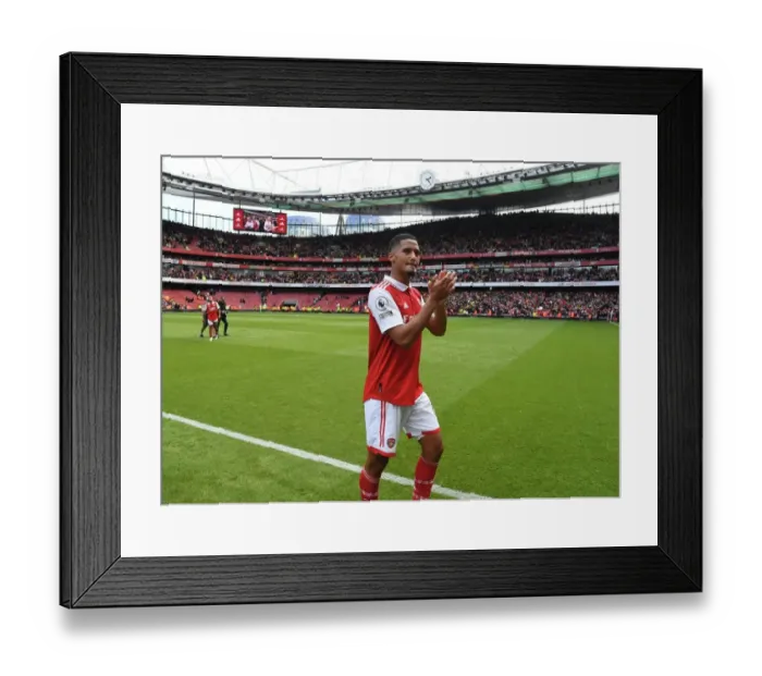 Framed Print : Arsenal's William Saliba Applauding Fans After Arsenal vs. Tottenham Premier League Match, 2022-23 Framed Print : Arsenal's William Saliba Applauding Fans After Arsenal vs. Tottenham Premier League Match, 2022-23