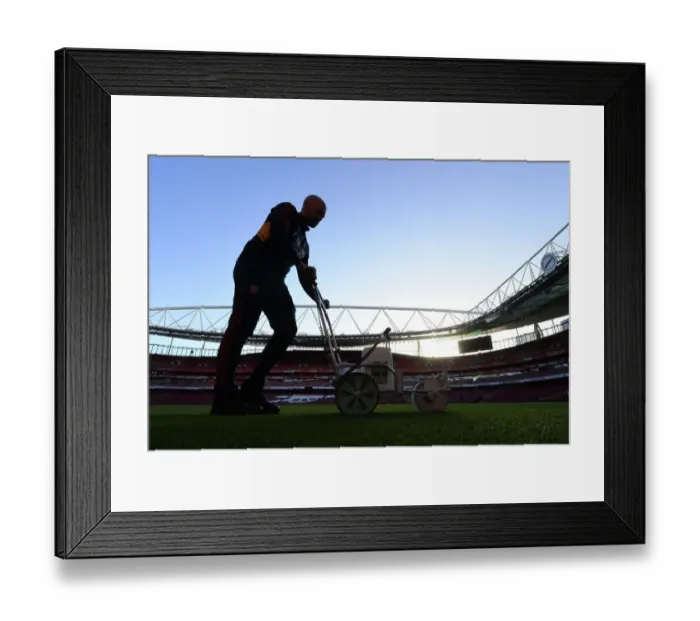 Framed Print : Arsenal vs. Tottenham: Pre-Match Pitch Preparation at Emirates Stadium (2022-23)