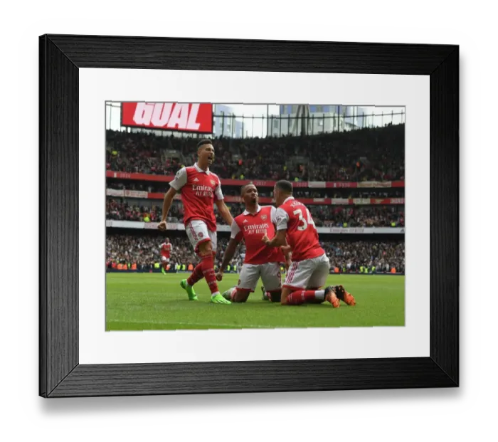 Framed Print : Arsenal's Jesus, Martinelli, and Xhaka: Triumphant Celebration of Goals Against Tottenham in the 2022-23 Premier League