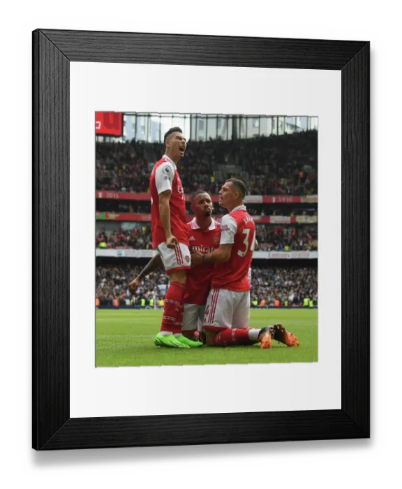 Framed Print : Arsenal's Jesus and Martinelli: Celebrating Glory Over Tottenham in the 2022-23 Premier League Showdown Framed Print : Arsenal's Jesus and Martinelli: Celebrating Glory Over Tottenham in the 2022-23 Premier League Showdown