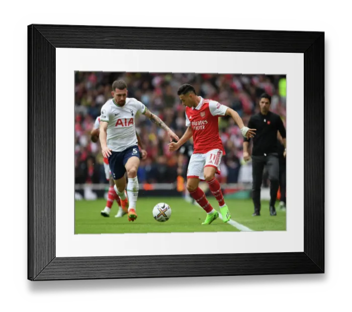 Framed Print : Martinelli vs. Hojbjerg: A Fiery Face-Off in the Arsenal-Tottenham Premier League Battle (2022-23)