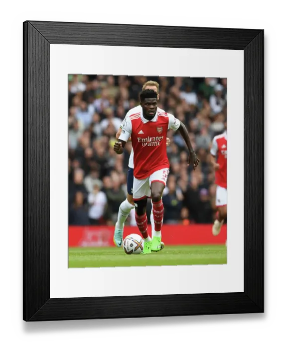 Framed Print : Thomas Partey in Action: Arsenal vs. Tottenham Rivalry, Premier League 2022-23 - Emirates Stadium Framed Print : Thomas Partey in Action: Arsenal vs. Tottenham Rivalry, Premier League 2022-23 - Emirates Stadium