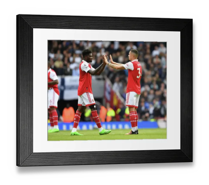 Framed Print : Arsenal's Partey and Xhaka Face Off Against Tottenham in the 2022-23 Premier League Framed Print : Arsenal's Partey and Xhaka Face Off Against Tottenham in the 2022-23 Premier League