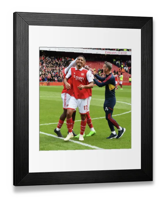 Framed Print : Arsenal's William Saliba Trains with Coaches Ahead of Arsenal v Tottenham Showdown (2022-23)