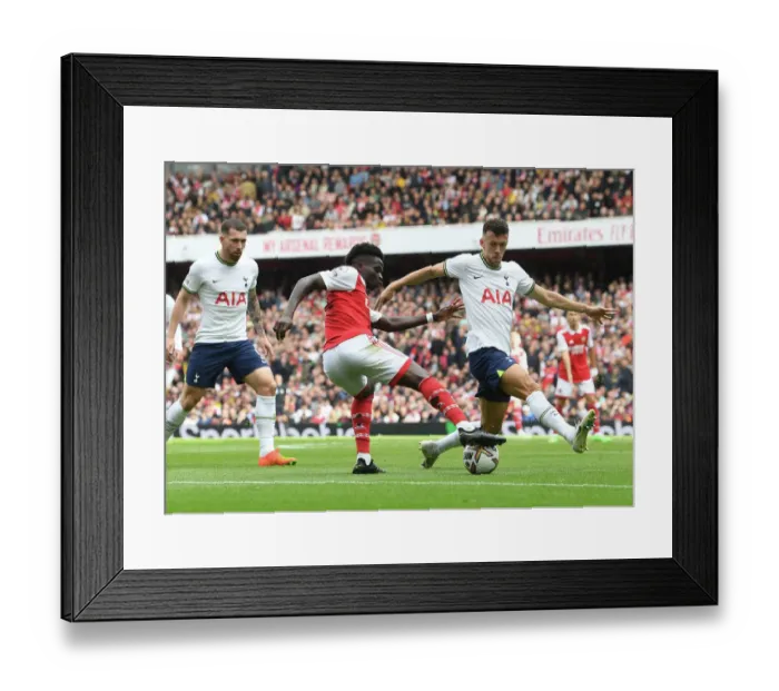 Framed Print : Arsenal vs. Tottenham: Bukayo Saka Faces Off Against Ivan Perisic in the 2022-23 Premier League Clash at Emirates Stadium Framed Print : Arsenal vs. Tottenham: Bukayo Saka Faces Off Against Ivan Perisic in the 2022-23 Premier League Clash at Emirates Stadium