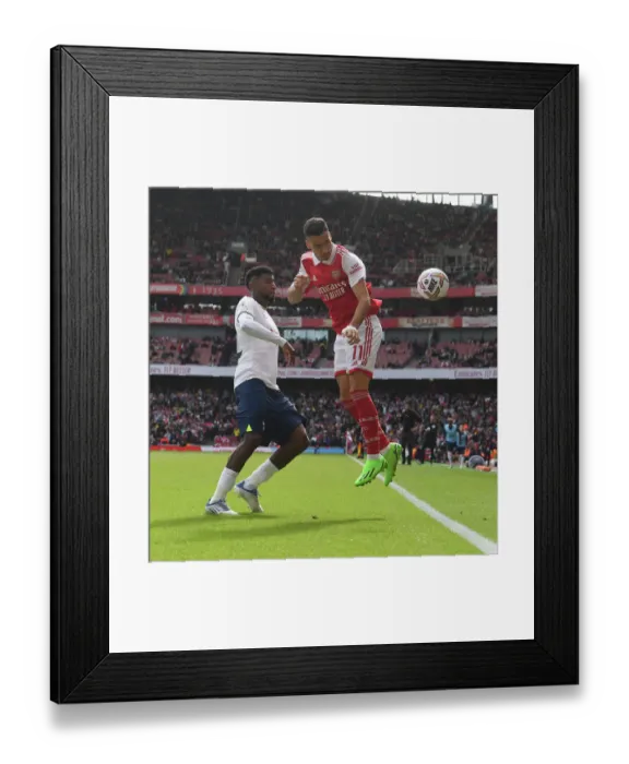 Framed Print : Arsenal vs. Tottenham: Martinelli vs. Emerson Royal Clash in the 2022-23 Premier League Framed Print : Arsenal vs. Tottenham: Martinelli vs. Emerson Royal Clash in the 2022-23 Premier League