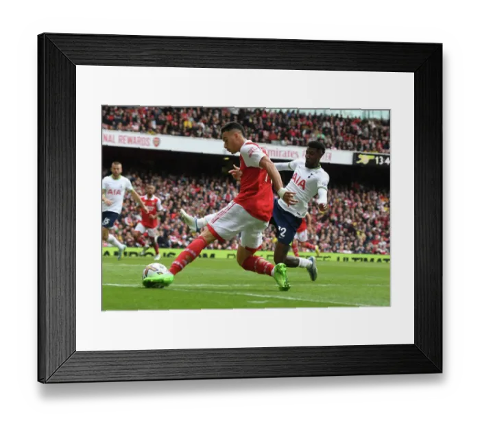 Framed Print : Arsenal's Martinelli Clashes with Tottenham's Emerson Royal in 2022-23 Premier League Showdown