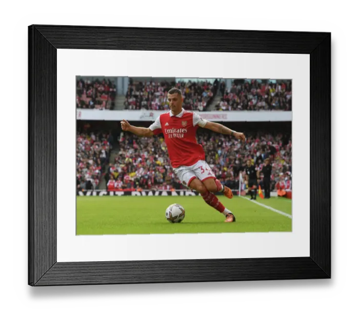 Framed Print : Granit Xhaka: In Action for Arsenal Against Tottenham, Premier League 2022-23 Framed Print : Granit Xhaka: In Action for Arsenal Against Tottenham, Premier League 2022-23