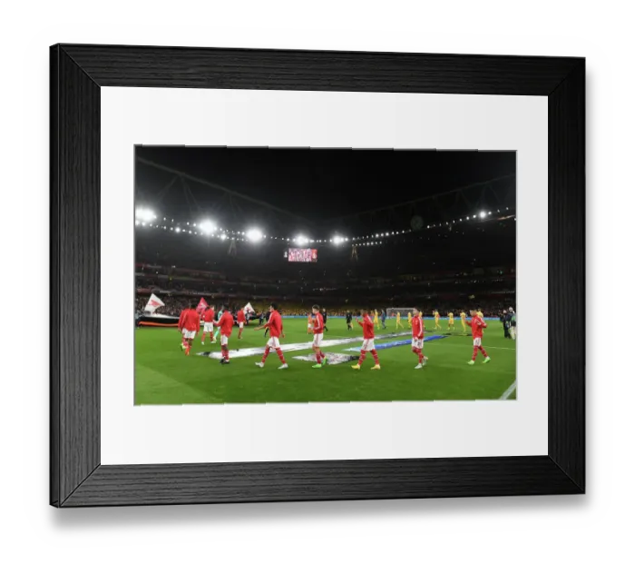 Framed Print : Arsenal Players Take the Field against FK Bodo / Glimt in Europa League Match Framed Print : Arsenal Players Take the Field against FK Bodo / Glimt in Europa League Match