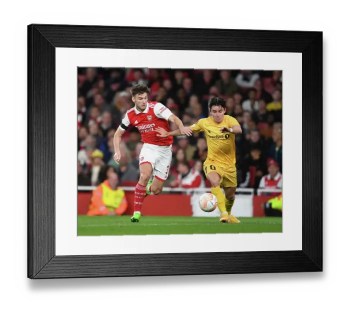 Framed Print : Arsenal's Kieran Tierney Chases Down Opponent in Europa League Thriller