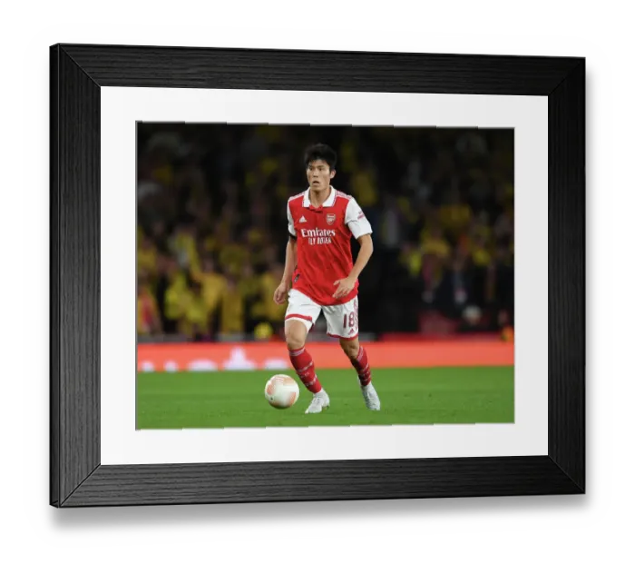 Framed Print : Arsenal's Tomiyasu in Action: Arsenal vs FK Bodo / Glimt, Europa League 2022-23