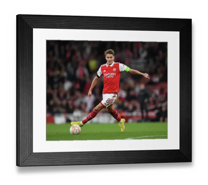 Framed Print : Arsenal's Martin Odegaard Shines: Europa League Domination Over FK Bodo / Glimt Framed Print : Arsenal's Martin Odegaard Shines: Europa League Domination Over FK Bodo / Glimt