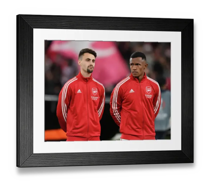 Framed Print : Arsenal FC: Fabio Vieira and Marquinhos Sharing a Moment Before Arsenal v FK Bodo / Glimt, UEFA Europa League 2022-23 Framed Print : Arsenal FC: Fabio Vieira and Marquinhos Sharing a Moment Before Arsenal v FK Bodo / Glimt, UEFA Europa League 2022-23