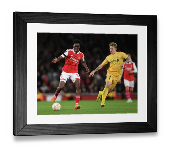 Framed Print : Arsenal's Albert Sambi Lokonga Goes Head-to-Head with Runar Espejord in Europa League Showdown