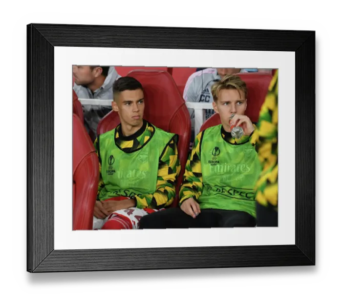 Framed Print : Arsenal FC: Pre-Match Moment between Catalin Cirjan and Martin Odegaard at Emirates Stadium vs FK Bodo / Glimt (2022-23)