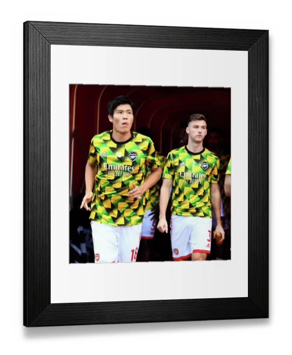 Framed Print : Arsenal's Tomiyasu and Tierney Before Arsenal v Liverpool (2022-23)